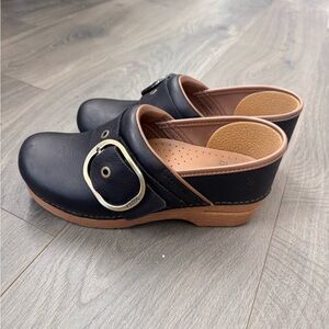 Dansko Black and Tan Leather Mules with Buckle